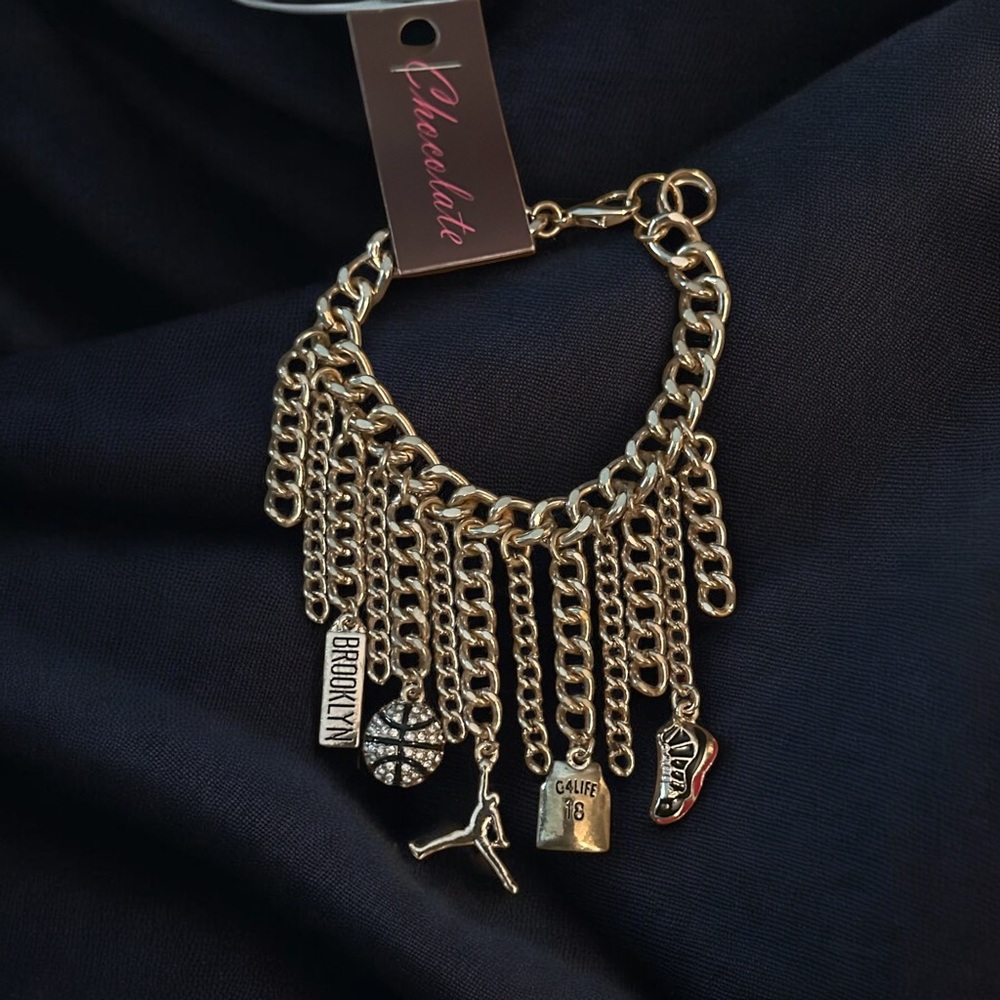 Chocolate Brooklyn Nets gold tone charm bracelet
